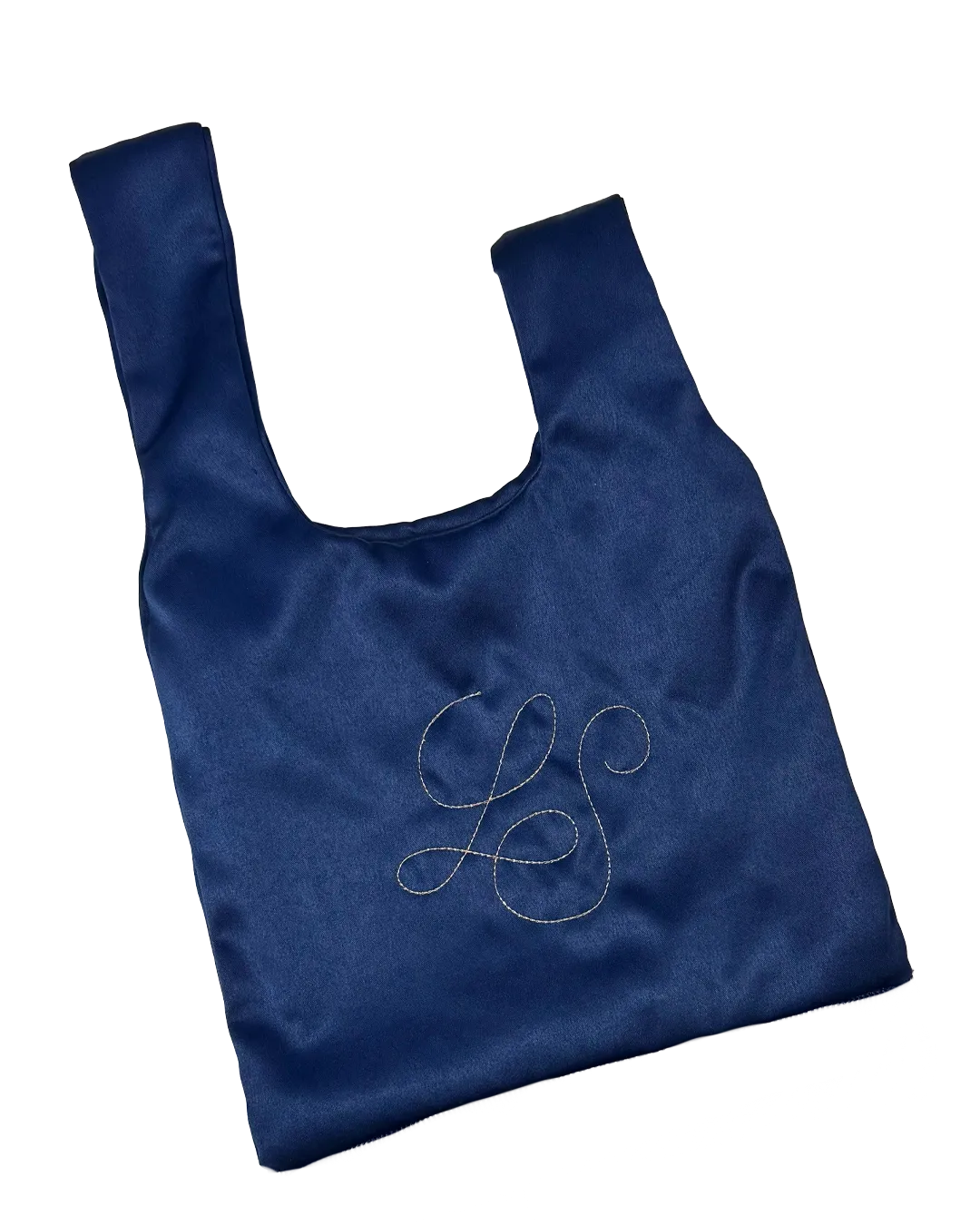 Monogramme LS brodé en calligraphie sur le satin marine d'un Knot Bag
